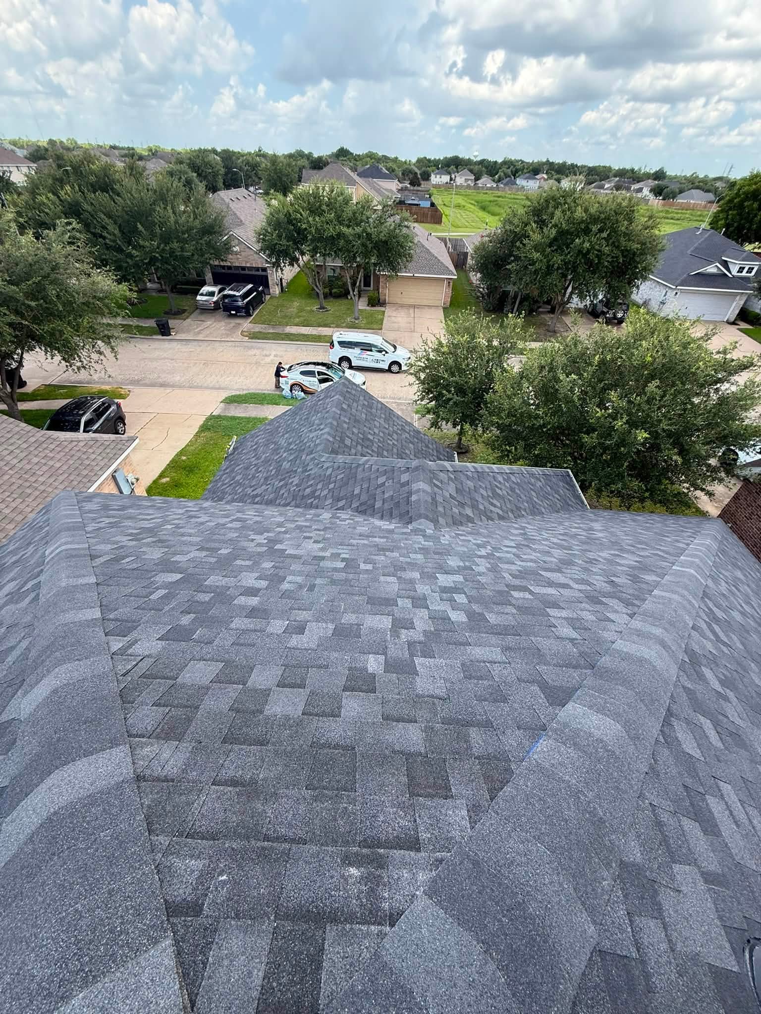 Houston Roofing Solution crew on-site during a roof replacement
