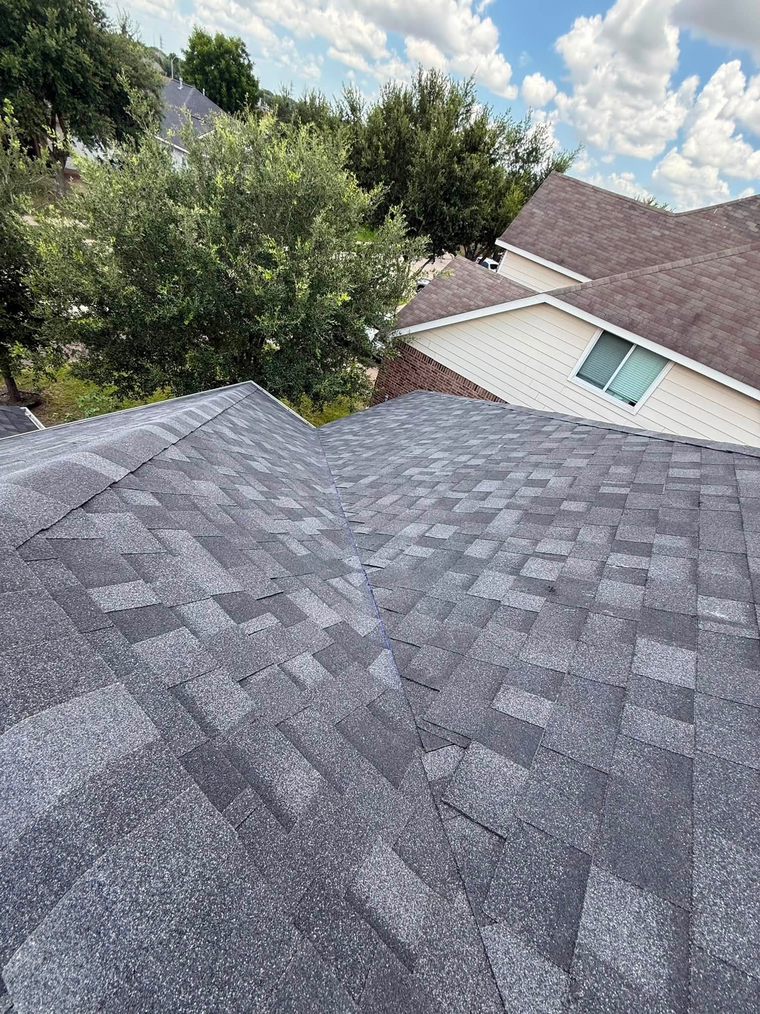 Close-up of freshly installed architectural shingles on a Houston roof